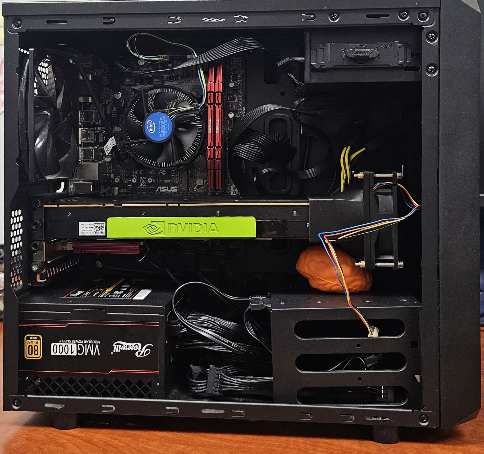 Tesla P100 with a 3D-printed shroud bolted to a Delta fan, in an X299 build