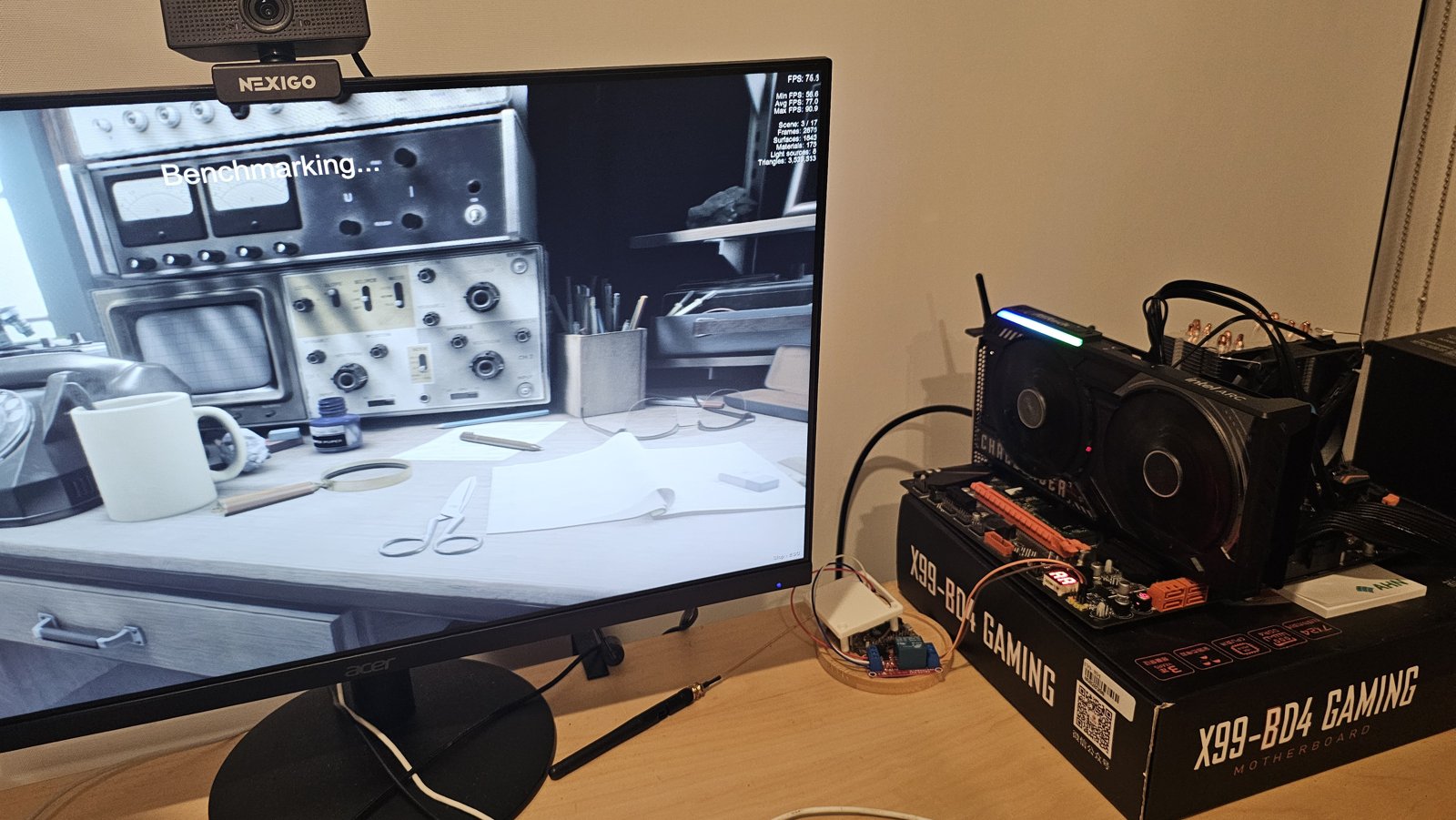 The X99-BD4 test bench running a benchmark with the Arc B580